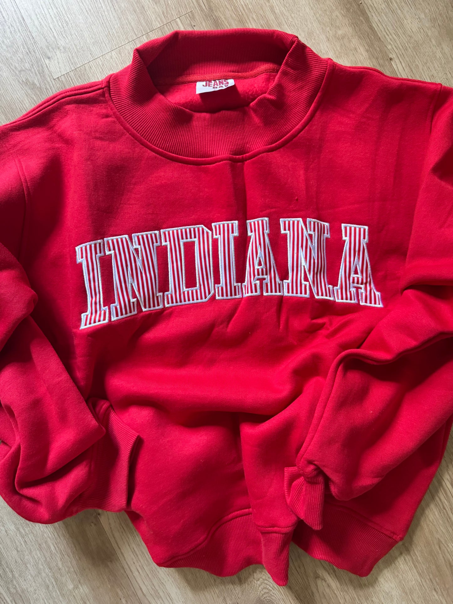 INDIANA Appliqué mock neck sweatshirt